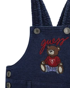 Salopette Guess in cotone stretch blu e maglia bianca a maniche lunghe
