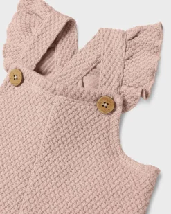Salopette Lil'Atelier rosa in tessuto effetto waffle in puro cotone con volant