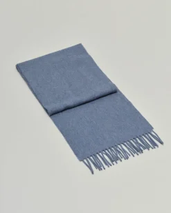 Sciarpa Bronte by Moon blu avio in pura lana merinos rifinita con frange
