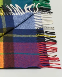 Sciarpa in lana merino a fantasia tartan multicolore con frange al fondo