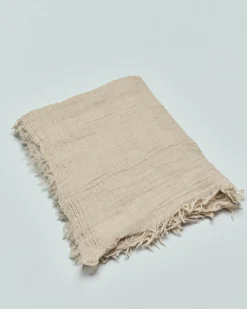 Sciarpa Raja beige in pura lana rifinita con frangette