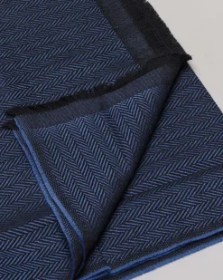 Sciarpa Raja color blu royal in tessuto spinato a trama nera di pura lana