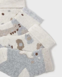 Set di quattro calze beige grigi e panna a fantasia animaletti in misto cotone stretch