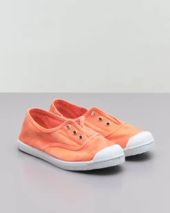 Sneakers slip-on arancioni senza lacci in canvas di cotone effetto stone washed