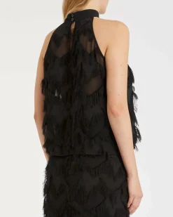 Top nero Marella in georgette a motivo a rombi con frange applicate e scollo all'americana