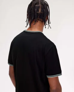 T-shirt mezza manica Fred Perry nera con bordino carta da zucchero