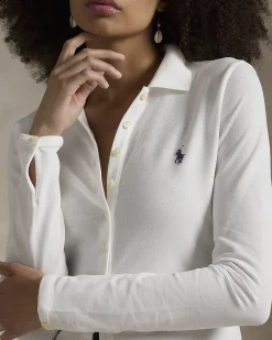 T-shirt bianca in piquè di cotone a maniche lunghe con bottoni e colletto a camicia