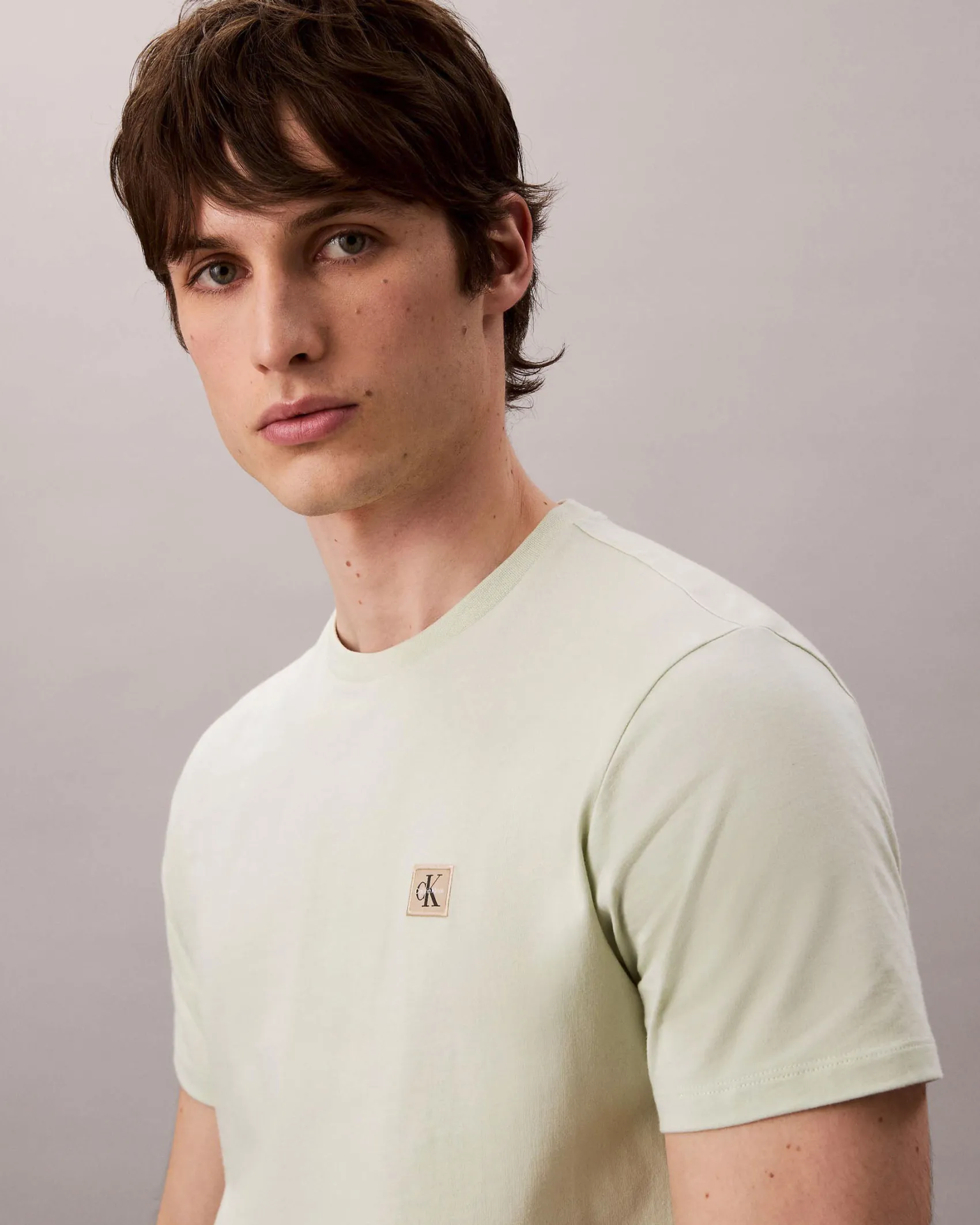 T-shirt Calvin Klein Jeans verde menta in cotone con patch logo applicato sul petto