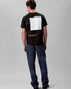 T-shirt Calvin Klein Jeans nera in cotone con logo stampato sul petto e maxi grafica sul retro