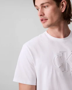 T-shirt Calvin Klein Jeans bianca in cotone con logo monogramma impresso in tono davanti