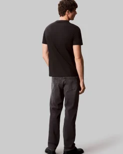 T-shirt Calvin Klein Jeans nera in cotone con logo grafico stampato sul petto