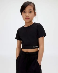 T-shirt cropped Calvin Klein nera con elastico porta logo