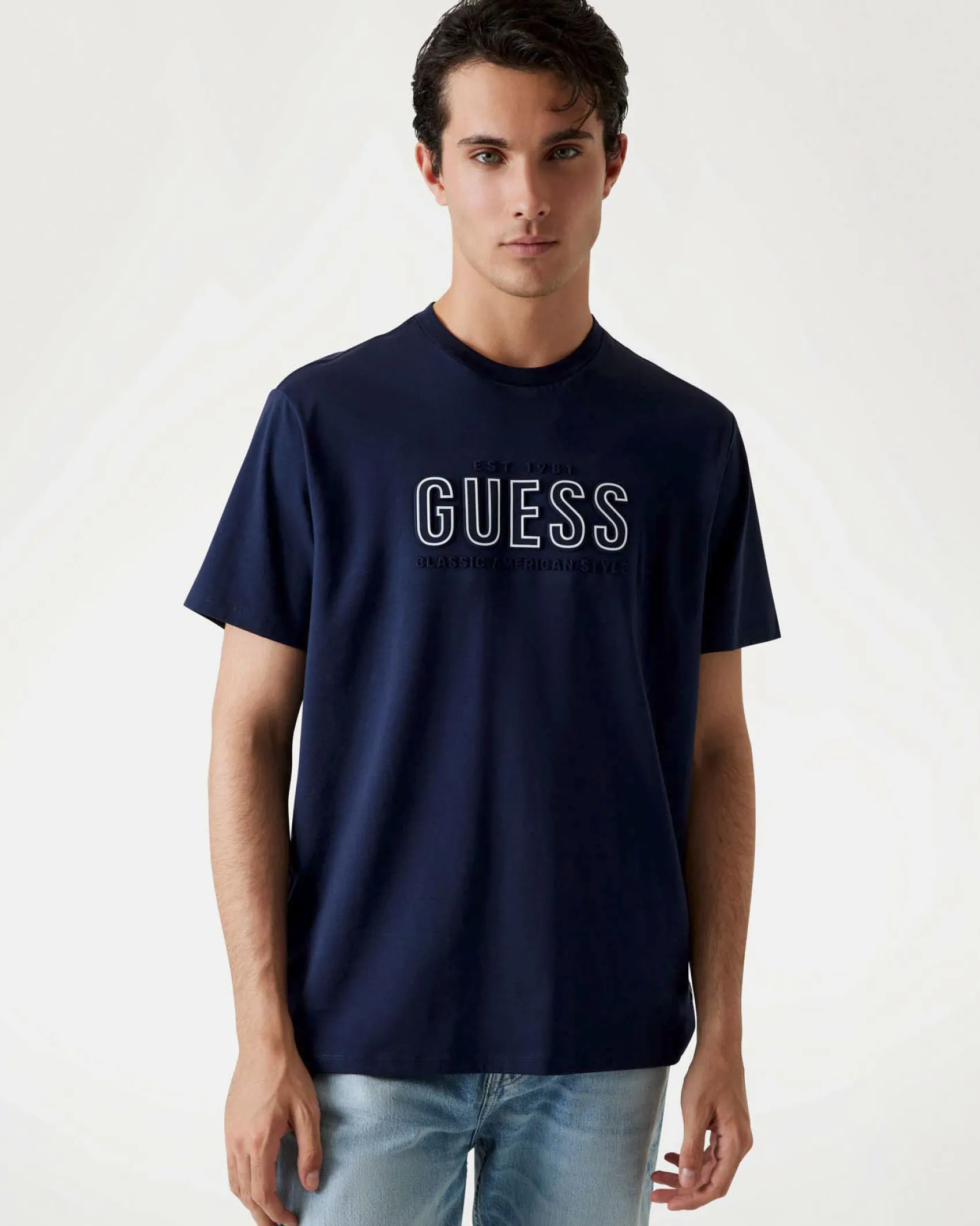 T-shirt Guess blu in cotone con logo scritta in rilievo sul petto