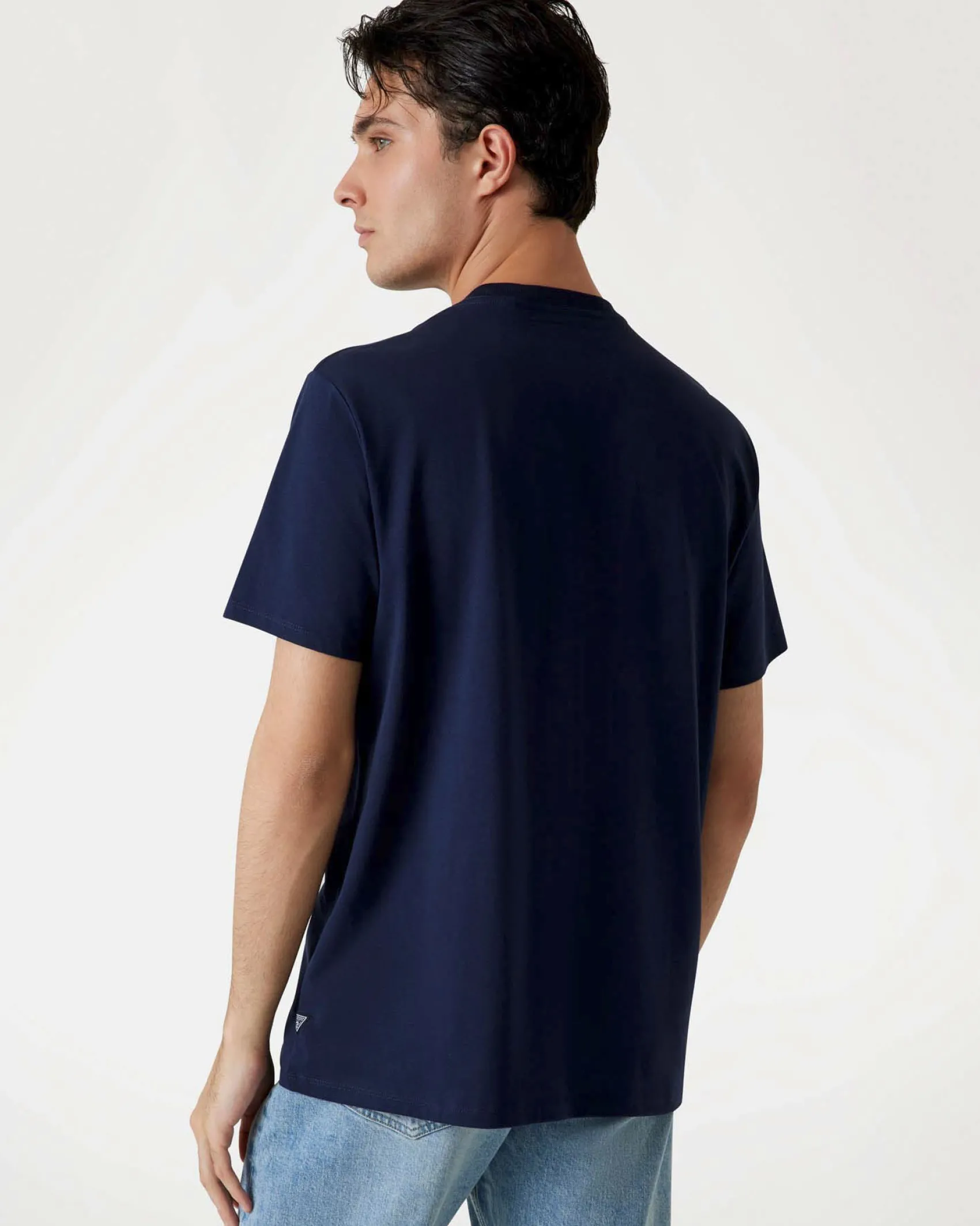T-shirt Guess blu in cotone con logo scritta in rilievo sul petto