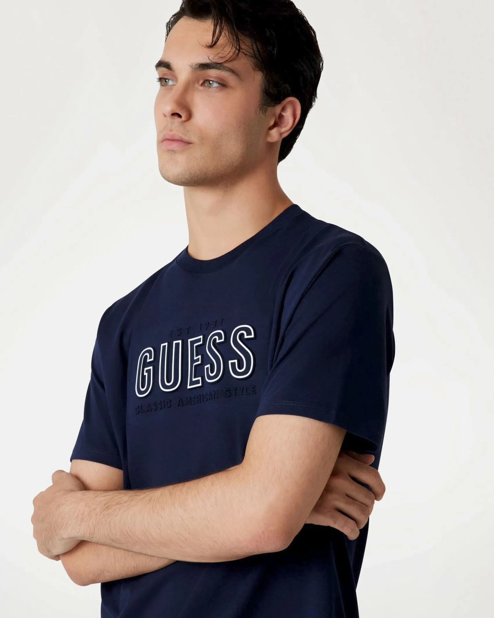 T-shirt Guess blu in cotone con logo scritta in rilievo sul petto