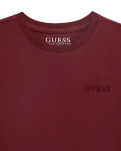 T-shirt Guess bordeaux mezza manica in puro cotone con maxi triangolo logo sul retro