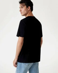 T-shirt Guess nera in cotone con stampa logo triangolo frontale