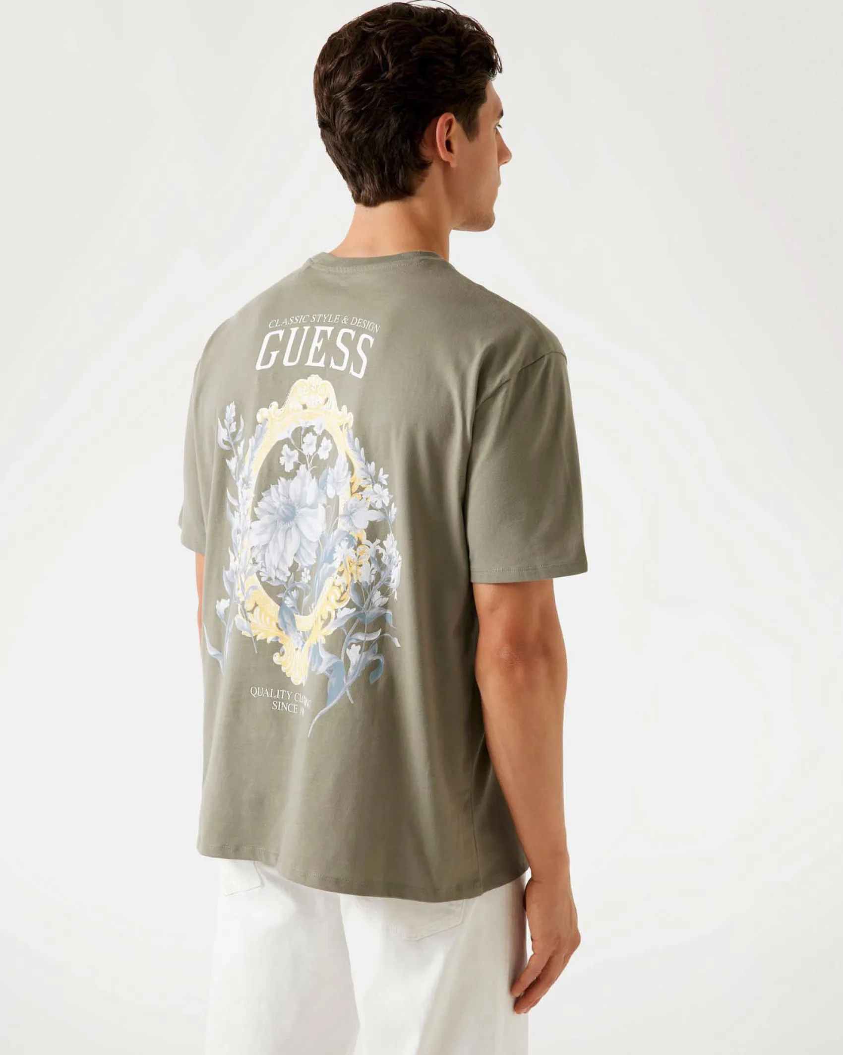 T-shirt Guess salvia in cotone con stampa floreale sul retro
