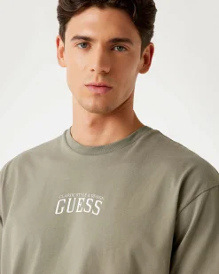 T-shirt Guess salvia in cotone con stampa floreale sul retro
