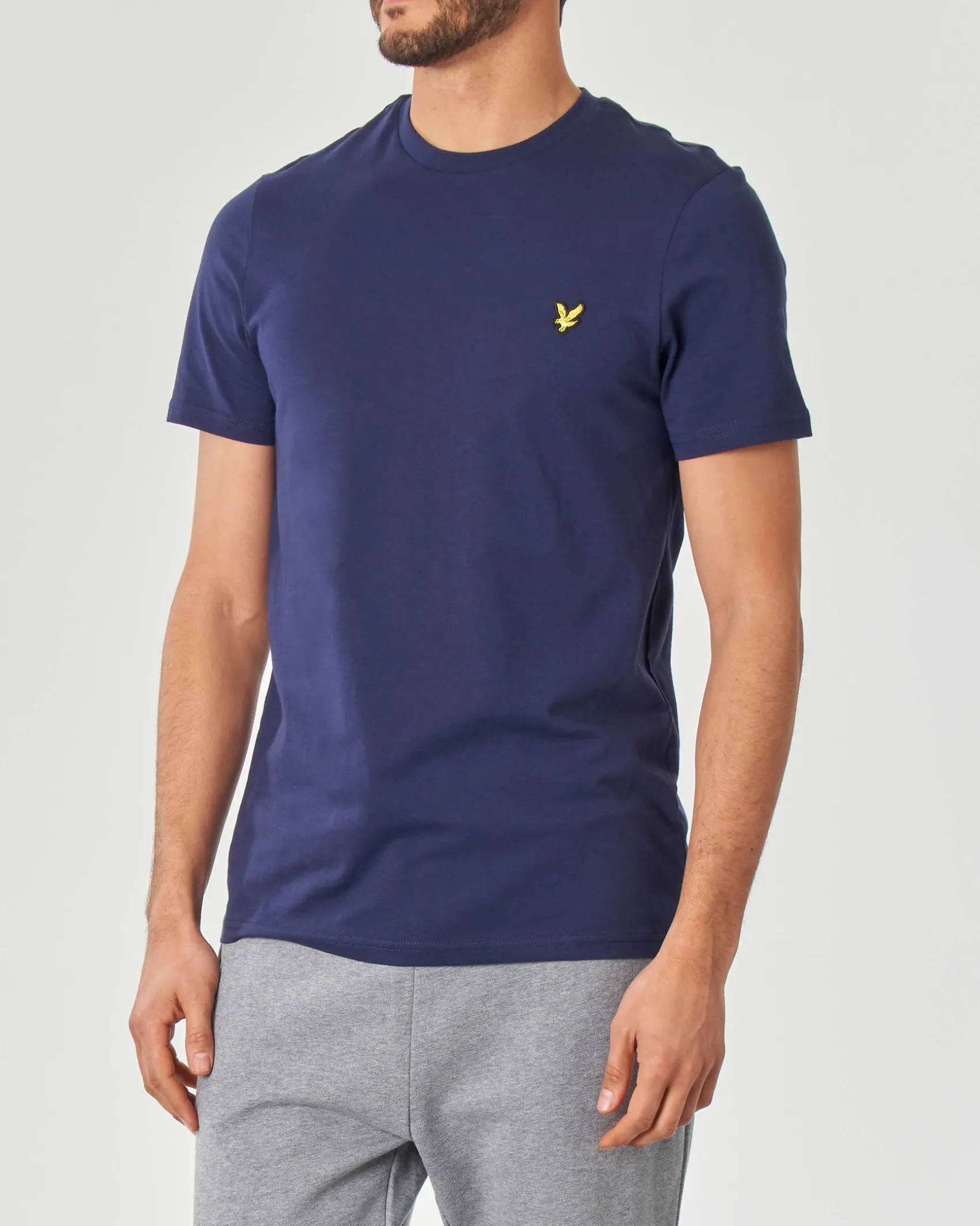 T-shirt mezza manica blu indaco in cotone con logo aquila gialla ricamata sul petto