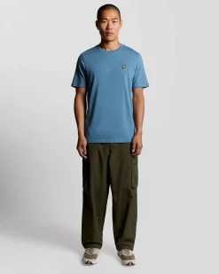T-shirt mezza manica Lyle & Scott celeste in cotone con logo aquila gialla ricamata sul petto