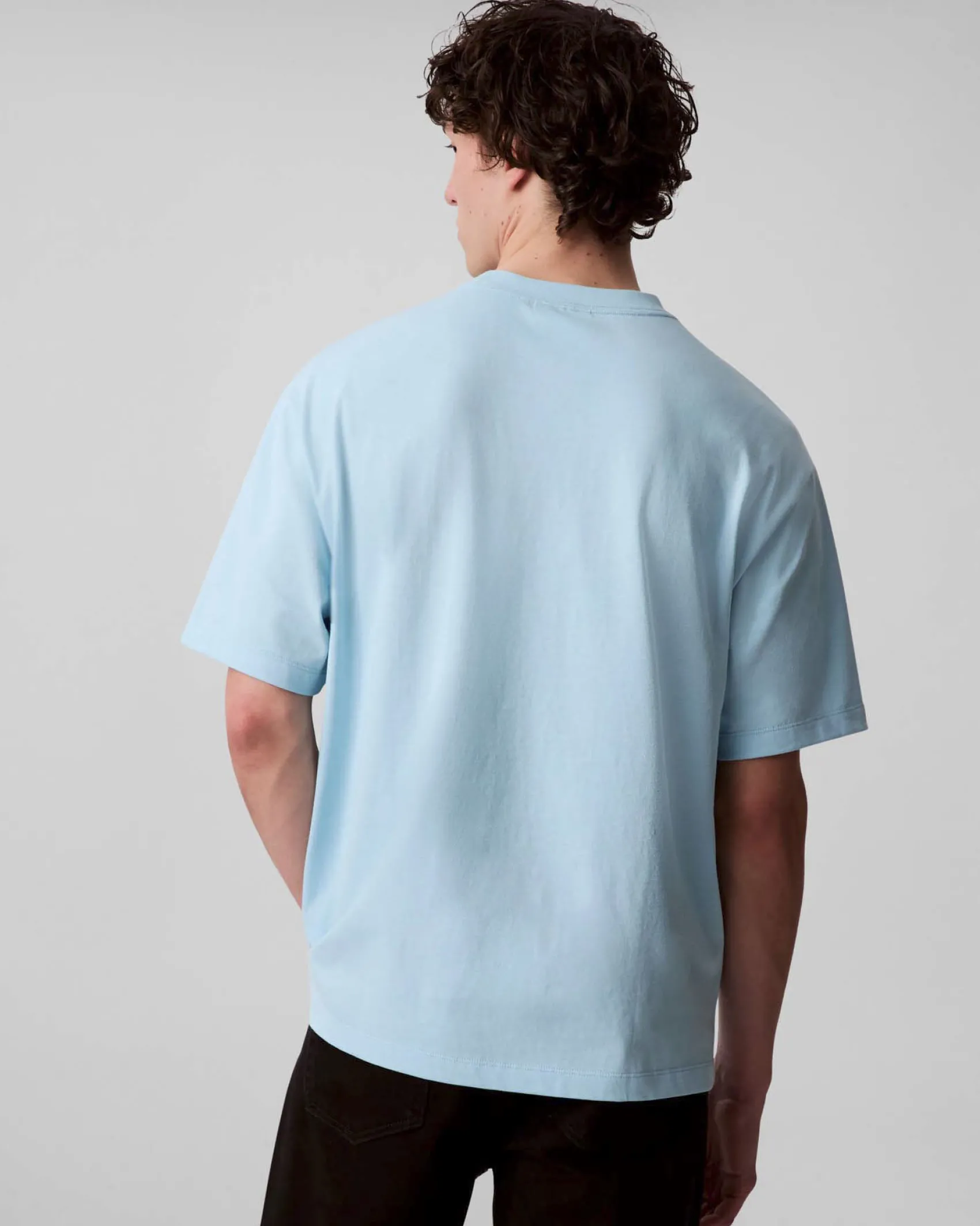 T-shirt relaxed-fit Calvin Klein Jeans azzurra in cotone con logo scritta in rilievo