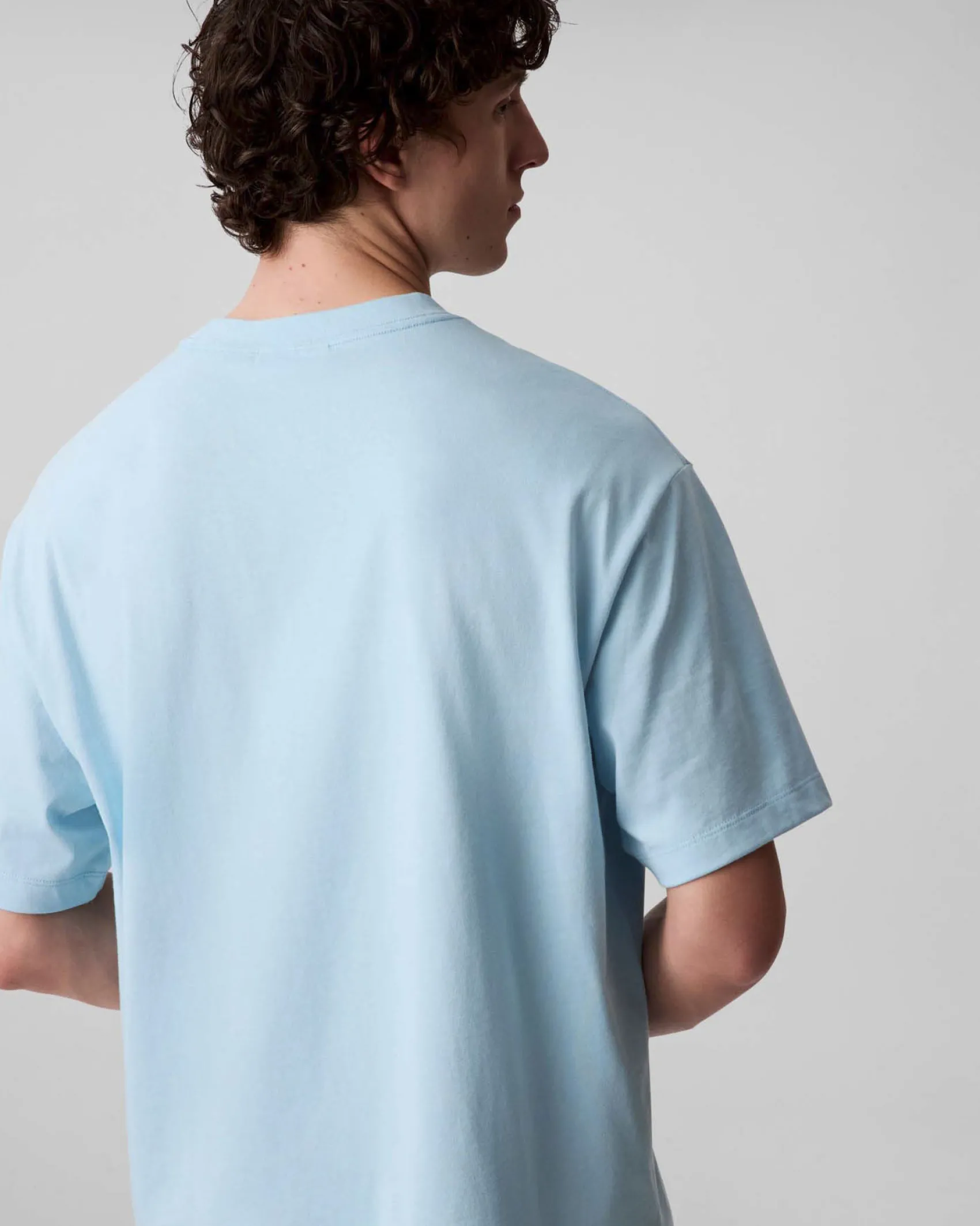 T-shirt relaxed-fit Calvin Klein Jeans azzurra in cotone con logo scritta in rilievo