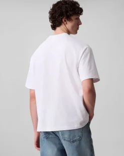 T-shirt relaxed-fit Calvin Klein Jeans bianca in cotone con logo scritta in rilievo