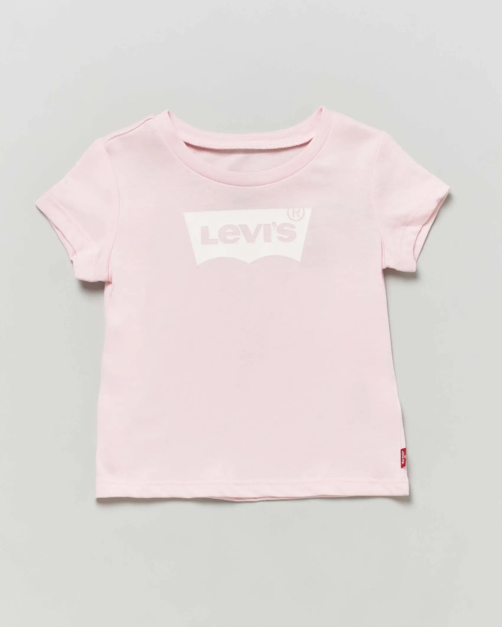 T-shirt rosa a maniche corte con logo batwing bianco