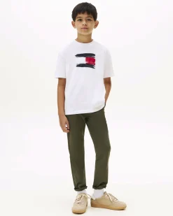 T-shirt Tommy Hilfiger bianca in puro cotone con bandiera logo spennellata