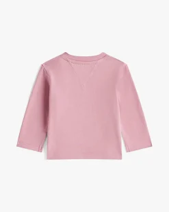 T-shirt Tommy Hilfiger rosa in misto cotone a maniche lunghe e scritta logo