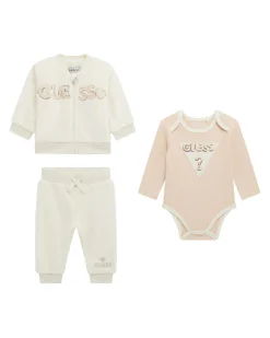 Tuta Guess bianca e rosa in tessuto teddy con body