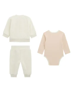 Tuta Guess bianca e rosa in tessuto teddy con body