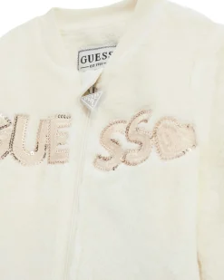 Tuta Guess bianca e rosa in tessuto teddy con body