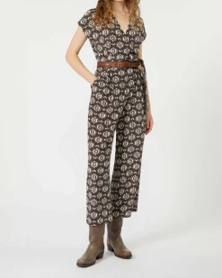 Tuta Weekend Max Mara in seta marrone a fantasia fiori bianchi con maniche ad aletta