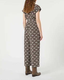 Tuta Weekend Max Mara in seta marrone a fantasia fiori bianchi con maniche ad aletta