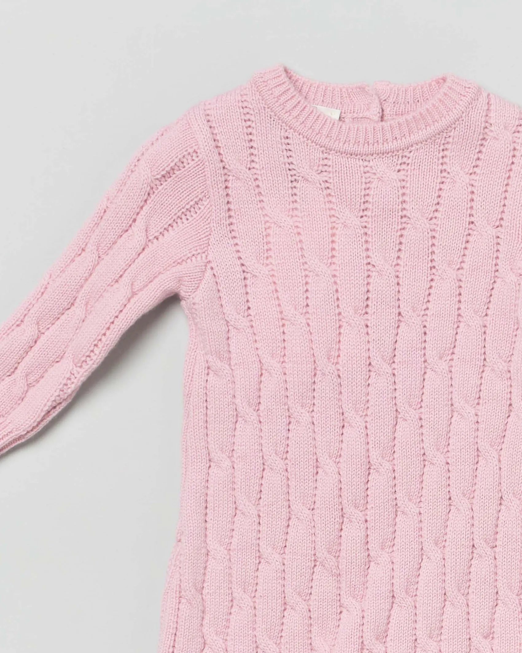 Tutina rosa in pura lana a trecce a maniche lunghe