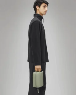 Wash Bag Small beauty case Rains tortora con manico per il trasporto